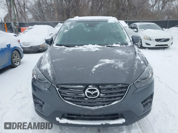 2016 Mazda CX-5 Grand Touring with VIN JM3KE4DY2G0913412, listed as a IAAI auction lot 41616132 with 85,166 mi miles. Bid and sale history available at carsss.com. Image 12.