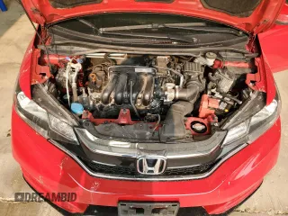 2018 Honda Fit Sport z VIN 3HGGK5H69JM702073, wystawiony jako Copart lot #58813115 z przebiegiem 51 998 mil mil oraz Nie do naprawy • Non repairable. Historia ofert i sprzedaży dostępna na DreamBid. Obrazek 11.