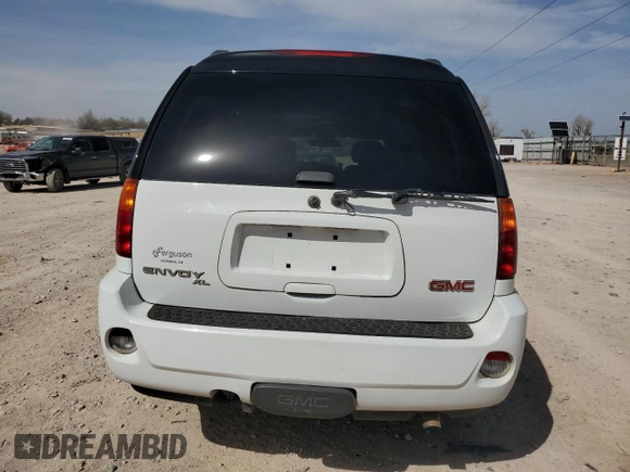 2006 GMC Envoy XL Denali with VIN 1GKES66MX66120332, listed as a Copart auction lot 49632955 with 100,580 mi miles and Salvage Title. Bid and sale history available at carsss.com. Image 6.