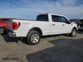 2021 Ford F-150 XL with VIN 1FTFW1E83MFB80686, listed as a Copart auction lot 52386125 with 156,582 mi miles and Salvage Title. Bid and sale history available at carsss.com. Image 3.