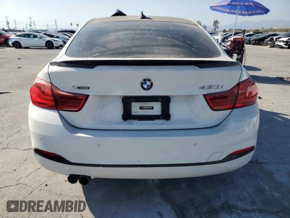 2019 BMW 4 Series 430i xDrive z VIN WBA4J3C56KBL05093, wystawiony jako Copart lot #52215335 z przebiegiem 55 900 mil mil oraz Szkoda całkowita • Salvage title. Historia ofert i sprzedaży dostępna na DreamBid. Obrazek 6.
