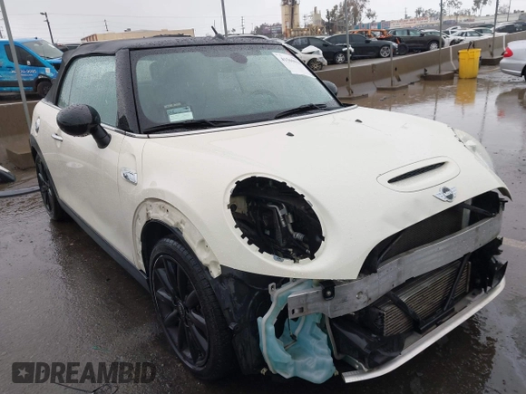 2016 MINI Convertible S z VIN WMWWG9C52G3C21934, wystawiony jako IAAI lot #41569029 z przebiegiem 102 042 mil mil oraz . Historia ofert i sprzedaży dostępna na DreamBid. Obrazek 1.