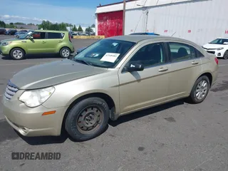 2010 Chrysler Sebring Touring z VIN 1C3CC4FBXAN144734, wystawiony jako IAAI lot #42548485 z przebiegiem 160 588 mil mil oraz . Historia ofert i sprzedaży dostępna na DreamBid. Obrazek 2.