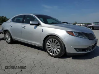 2013 Lincoln MKS with VIN 1LNHL9EK0DG612314, listed as a Copart auction lot 52901685 with 124,828 mi miles and Salvage title. Bid and sale history available at DreamBid. Image 4.