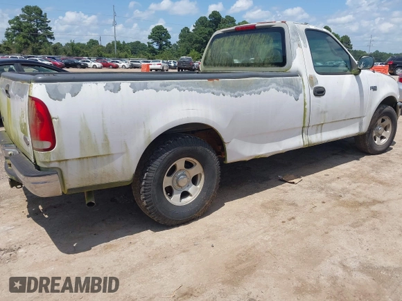 1998 Ford F-150 with VIN 1FTZF1724WKB57921, listed as a IAAI auction lot 42706692 with 213,913 mi miles and . Bid and sale history available at DreamBid. Image 4.