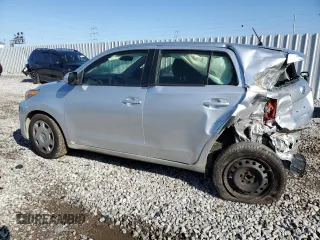 2013 Scion xD with VIN JTKKUPB40D1035989, listed as a Copart auction lot 52076475 with 213,548 mi miles and Salvage Title. Bid and sale history available at carsss.com. Image 2.