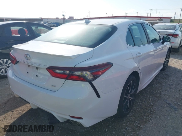 2023 Toyota Camry SE with VIN 4T1G11AK2PU749916, listed as a IAAI auction lot 42014107 with 61,561 mi miles. Bid and sale history available at carsss.com. Image 4.