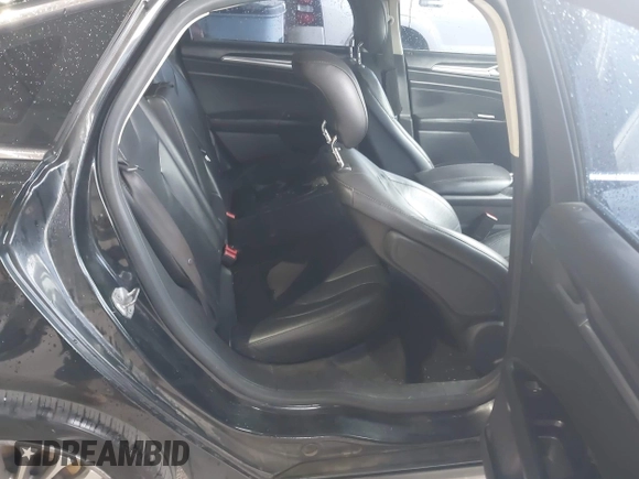 2014 Ford Fusion Titanium with VIN 3FA6P0K99ER235785, listed as a IAAI auction lot 41946638 with 212,939 mi miles and . Bid and sale history available at DreamBid. Image 8.