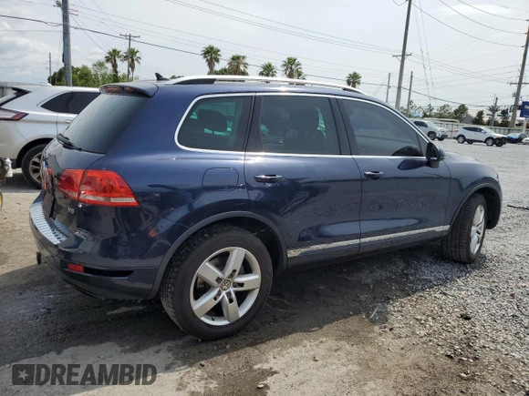 2013 Volkswagen Touareg Lux с VIN WVGEF9BP0DD002456, выставлен на аукционе Copart как лот 56034435 с пробегом 131 412 миль миль и Списание • Salvage title. История ставок и продаж доступна на DreamBid. Изображение 3.