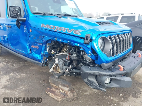 2024 Jeep Gladiator Mojave X z VIN 1C6JJTEG5RL121313, wystawiony jako IAAI lot #41013599 z przebiegiem 2 952 mil mil oraz . Historia ofert i sprzedaży dostępna na DreamBid. Obrazek 6.