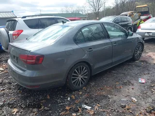 2016 Volkswagen Jetta Sport z VIN 3VWD17AJ7GM225289, wystawiony jako IAAI lot #41978267 z przebiegiem 142 556 mil mil oraz . Historia ofert i sprzedaży dostępna na DreamBid. Obrazek 4.