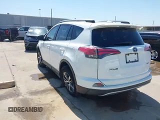 2018 Toyota RAV4 XLE with VIN JTMWFREV7JJ199383, listed as a IAAI auction lot 41859890 with 41,408 mi miles. Bid and sale history available at carsss.com. Image 3.