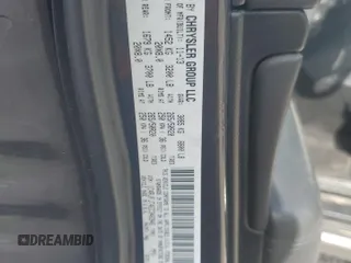 2014 Jeep Grand Cherokee Summit with VIN 1C4RJFJT4EC346946, listed as a Copart auction lot 60613025 with 50,565 mi miles and Salvage title. Bid and sale history available at DreamBid. Image 13.