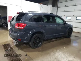 2018 Dodge Journey SXT z VIN 3C4PDDBG8JT390306, wystawiony jako Copart lot #49467735 z przebiegiem 144 012 mil mil oraz Czysty tytuł • Clean title. Historia ofert i sprzedaży dostępna na DreamBid. Obrazek 3.