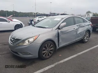 2013 Hyundai Sonata Limited with VIN 5NPEC4AC7DH579641, listed as a IAAI auction lot 40852052 with 208,950 mi miles and . Bid and sale history available at carsss.com. Image 2.