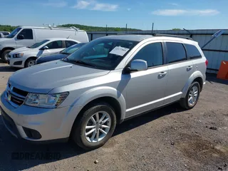 2014 Dodge Journey SXT with VIN 3C4PDCBG8ET118998, listed as a IAAI auction lot 42177885 with 165,247 mi miles. Bid and sale history available at carsss.com. Image 2.