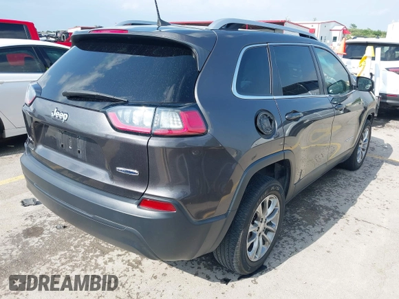 2019 Jeep Cherokee Latitude Plus with VIN 1C4PJLLB3KD143546, listed as a IAAI auction lot 42160353 with 69,296 mi miles and . Bid and sale history available at DreamBid. Image 4.