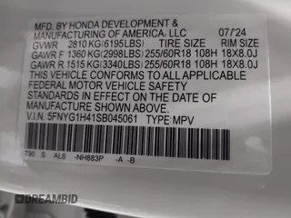 2025 Honda Pilot EX-L with VIN 5FNYG1H41SB045061, listed as a IAAI auction lot 41571217 with 7,971 mi miles and . Bid and sale history available at DreamBid. Image 9.