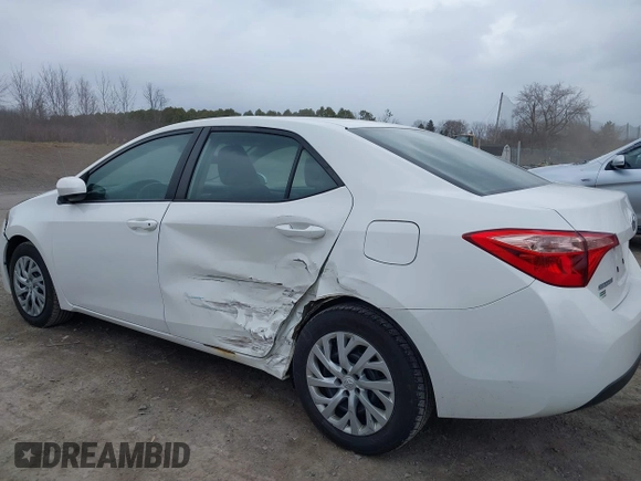 2019 Toyota Corolla L with VIN 5YFBURHE0KP889909, listed as a IAAI auction lot 41888953 with 130,529 mi miles. Bid and sale history available at carsss.com. Image 6.