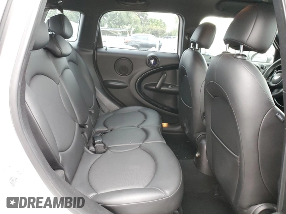 2013 MINI Countryman S with VIN WMWZC3C54DWP24877, listed as a Copart auction lot 53583655 with 97,734 mi miles and Salvage title. Bid and sale history available at DreamBid. Image 10.