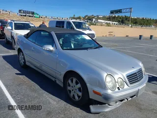 2003 Mercedes-Benz CLK 320 with VIN WDBLK65GX3T141076, listed as a IAAI auction lot 41365666 with 131,499 mi miles and . Bid and sale history available at carsss.com. Image 1.