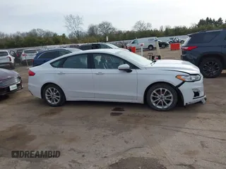 2020 Ford Fusion Hybrid SE with VIN 3FA6P0LU5LR195611, listed as a IAAI auction lot 41807998 with 128,439 mi miles. Bid and sale history available at carsss.com. Image 13.