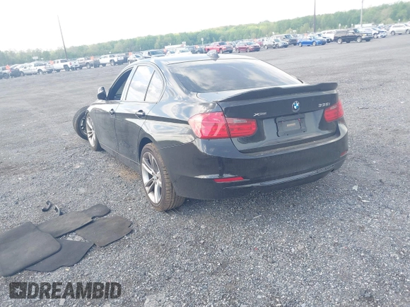 2013 BMW 3 Series 335i xDrive with VIN WBA3B9G54DNR89987, listed as a IAAI auction lot 42159592 with 165,999 mi miles and . Bid and sale history available at DreamBid. Image 3.