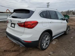 2016 BMW X1 xDrive28i with VIN WBXHT3C36GP884211, listed as a Copart auction lot 41121133 with 62,282 mi miles. Bid and sale history available at carsss.com. Image 3.