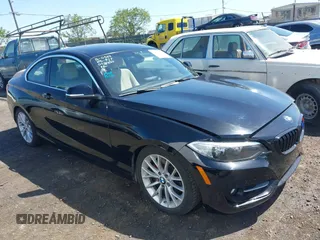 2016 BMW 2 Series 228i with VIN WBA1F9C5XGV545664, listed as a IAAI auction lot 39327505 with 94,583 mi miles. Bid and sale history available at carsss.com. Image 1.
