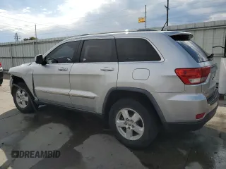 2011 Jeep Grand Cherokee Laredo with VIN 1J4RR4GG1BC576277, listed as a Copart auction lot 63220925 with 149,573 mi miles and Salvage title. Bid and sale history available at DreamBid. Image 2.