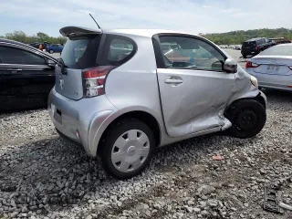 2012 Scion iQ with VIN JTNJJXB03CJ015321, listed as a Copart auction lot 54332355 with 63,439 mi miles and Salvage title. Bid and sale history available at DreamBid. Image 3.