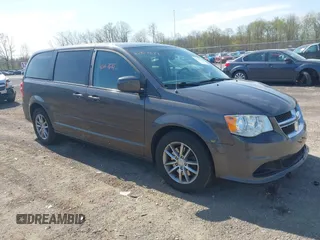 2015 Dodge Grand Caravan SE with VIN 2C4RDGBG2FR684367, listed as a IAAI auction lot 42167621 with 216,628 mi miles and . Bid and sale history available at DreamBid. Image 1.