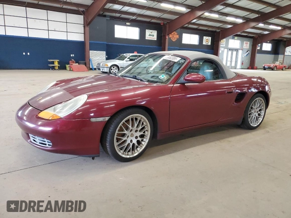 1999 Porsche Boxster z VIN WP0CA298XXU626611, wystawiony jako Copart lot #50950385 z przebiegiem 101 051 mil mil oraz Czysty tytuł • Clean title. Historia ofert i sprzedaży dostępna na DreamBid. Obrazek 1.