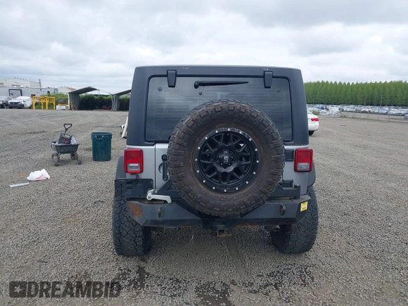 2018 Jeep Wrangler Unlimited Sport S with VIN 1C4BJWDG4JL861052, listed as a IAAI auction lot 42100517 with 43,907 mi miles and . Bid and sale history available at DreamBid. Image 17.