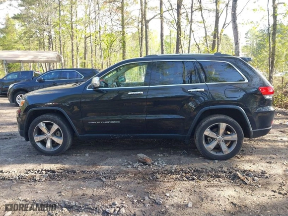 2015 Jeep Grand Cherokee Limited with VIN 1C4RJFBM6FC618650, listed as a IAAI auction lot 42031535 with 133,049 mi miles. Bid and sale history available at carsss.com. Image 14.