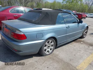 2004 BMW 3 Series 325Ci with VIN WBABW33454PL25129, listed as a IAAI auction lot 42027355 with 124,681 mi miles. Bid and sale history available at carsss.com. Image 4.