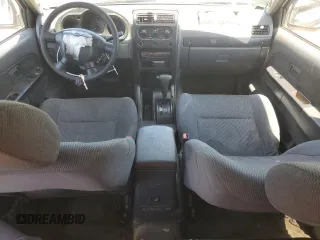 2002 Nissan Frontier XE z VIN 1N6ED29X72C374187, wystawiony jako Copart lot #55688645 z przebiegiem 354 656 mil mil oraz Szkoda całkowita • Salvage title. Historia ofert i sprzedaży dostępna na DreamBid. Obrazek 8.