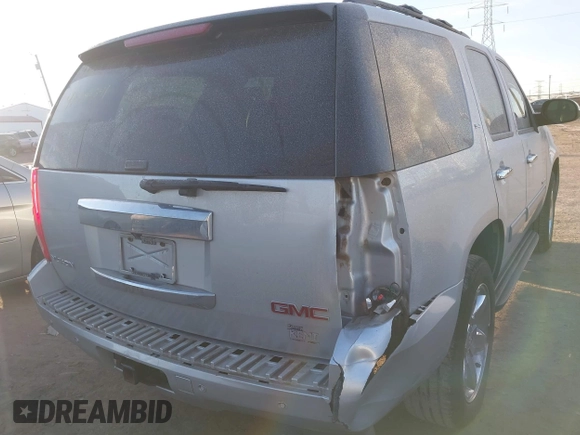 2014 GMC Yukon SLT with VIN 1GKS2CE00ER225071, listed as a IAAI auction lot 41581341 with 113,212 mi miles. Bid and sale history available at carsss.com. Image 4.