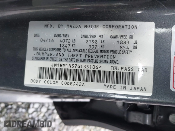 2016 Mazda 3 S Grand Touring z VIN JM1BM1N37G1351062, wystawiony jako IAAI lot #41573775 z przebiegiem 68 634 mil mil oraz . Historia ofert i sprzedaży dostępna na DreamBid. Obrazek 9.
