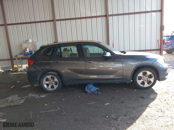2013 BMW X1 28i with VIN WBAVM1C53DVW43228, listed as a IAAI auction lot 41301776 with 61,323 mi miles. Bid and sale history available at carsss.com. Image 13.