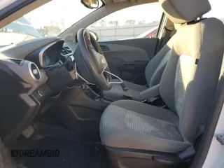 2018 Chevrolet Sonic LS with VIN 1G1JB5SH8J4121988, listed as a Copart auction lot 88000095 with 64,875 mi miles and Salvage title. Bid and sale history available at DreamBid. Image 7.
