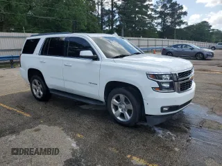 2016 Chevrolet Tahoe LT with VIN 1GNSCBKC5GR306031, listed as a Copart auction lot 54071705 with 219,799 mi miles and Salvage title. Bid and sale history available at DreamBid. Image 4.