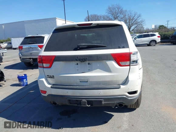 2012 Jeep Grand Cherokee Laredo with VIN 1C4RJFAT4CC229204, listed as a IAAI auction lot 41659491 with 141,143 mi miles. Bid and sale history available at carsss.com. Image 16.