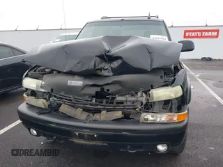 2004 Chevrolet Tahoe Z71 with VIN 1GNEK13T64R210008, listed as a IAAI auction lot 41641964 with 196,780 mi miles and . Bid and sale history available at DreamBid. Image 6.