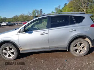 2013 Toyota RAV4 XLE with VIN JTMRFREV9DD013682, listed as a IAAI auction lot 42142414 with 202,680 mi miles. Bid and sale history available at carsss.com. Image 14.