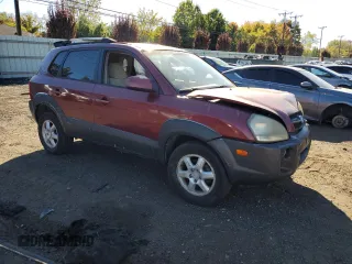 2005 Hyundai Tucson GLS with VIN KM8JN12D75U112964, listed as a Copart auction lot 75042354 with 77,827 mi miles and Salvage Title. Bid and sale history available at carsss.com. Image 4.