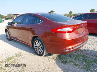 2014 Ford Fusion SE with VIN 3FA6P0H78ER239123, listed as a IAAI auction lot 42202797 with 167,086 mi miles and . Bid and sale history available at DreamBid. Image 3.
