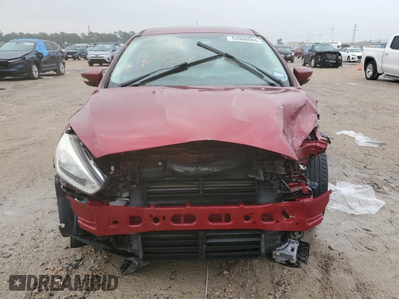 2017 Ford Focus SE z VIN 1FADP3F25HL299153, wystawiony jako Copart lot #53908065 z przebiegiem 108 745 mil mil oraz Szkoda całkowita • Salvage title. Historia ofert i sprzedaży dostępna na DreamBid. Obrazek 5.