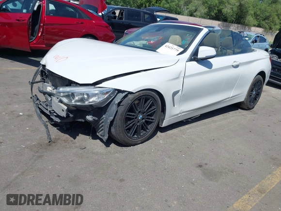 2014 BMW 4 Series 428i z VIN WBA3V5C5XEJ969029, wystawiony jako IAAI lot #42421779 z przebiegiem Nie podano mil oraz . Historia ofert i sprzedaży dostępna na DreamBid. Obrazek 17.