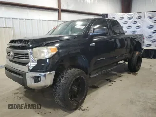2014 Toyota Tundra SR z VIN 5TFUW5F12EX333473, wystawiony jako Copart lot #52999205 z przebiegiem 208 045 mil mil oraz Czysty tytuł • Clean title. Historia ofert i sprzedaży dostępna na DreamBid. Obrazek 1.